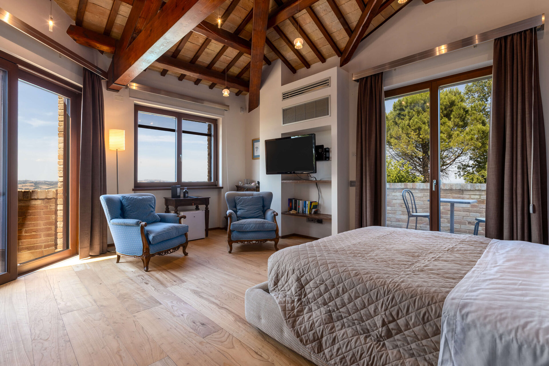 Camere - camera_poltrone_blu_vista-CLfgB1ZY